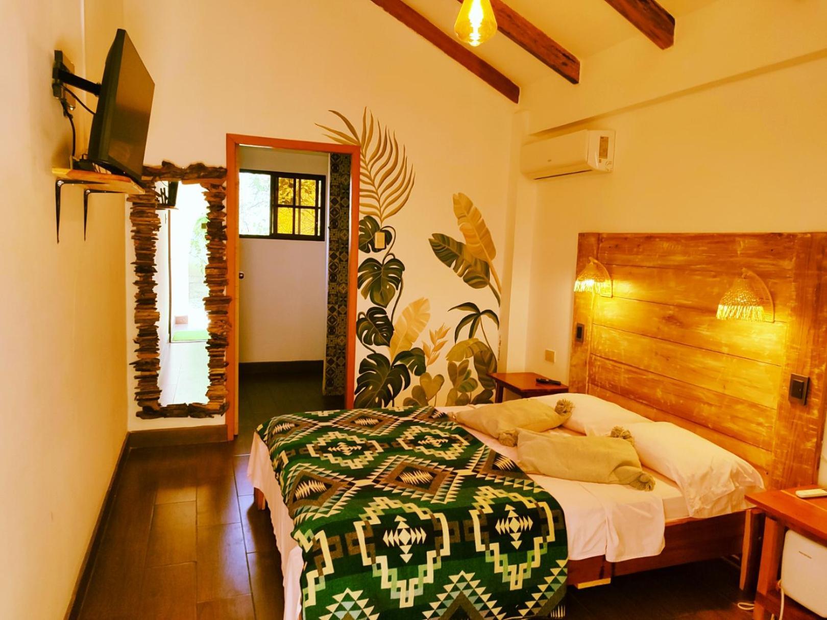 Hotel Café Madame à Puerto López Extérieur photo